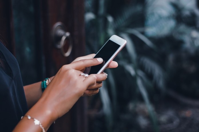woman using smartphone